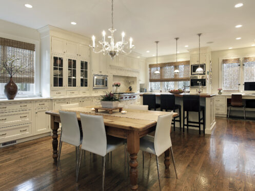 Kitchen and dining area with new lighting in a Paris, TN home